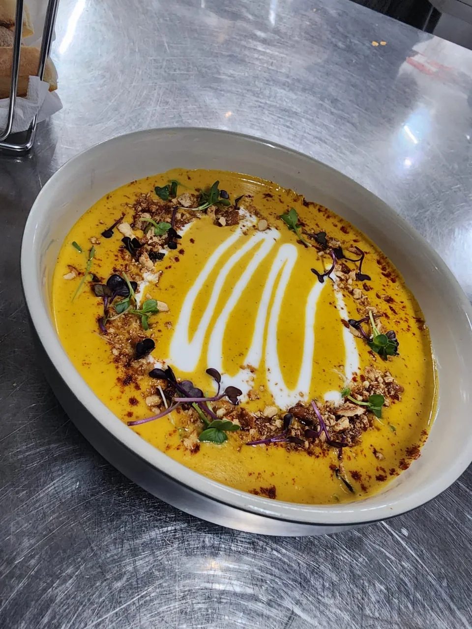 Soup finished with cream and herbs